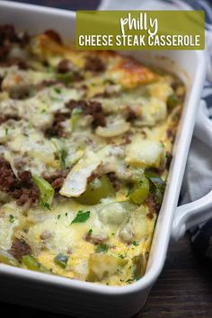 a casserole dish with cheese, meat and vegetables