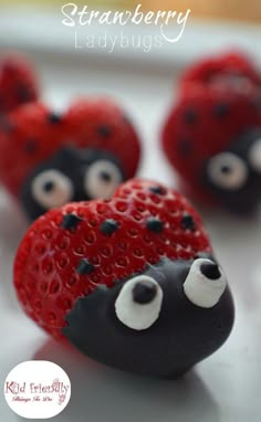 chocolate covered strawberries with googly eyes are ready to be made into ladybugs