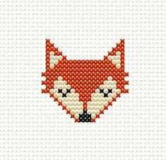 a cross stitch pattern with a red fox's head