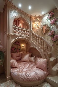 a bedroom with pink bedding and flowers on the wall next to stairs in it