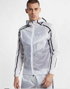 ~ Nike ~  Men's Tech Pack Running Jacket  Style: AQ6711 - Color: 100 White/Black - Size: XL  ~ Brand New with Tags - Retail $150.00 ~ Tech Pack melds technical innovation with forward-thinking design to deliver functional solutions that embody the intersection of sport and style  Super lightweight, soft translucent nylon fabric Water Repellent Reflective Trim 2-way zipper Internal, zippered chest pocket Adjustable Hood, Upper back vent Armpit to armpit measures approx. 26.5" Men Exercises, Jacket Nike, Nike Fit, Tech Pack, Sports Graphic Design, Bike Style, Nike Tech, Running Jacket, Nike Store