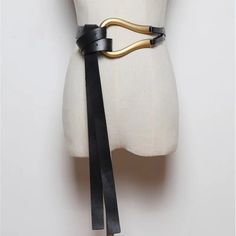 Upgrade your fashion game with our stunning black leather tie belt! Made from premium-quality leather, the soft and durable material offers a comfortable and stylish fit. The gold-tone belt buckle adds a touch of luxury and elegance to any outfit, making it perfect for both formal and casual occasions. Whether you're dressing up or down, our belt has got you covered. Big Buckle Belt, Shirt Knot, Wrap Belt, Layered Fashion, Faux Leather Belts, Fashion Pattern, Leather Belts, Belt Size, Waist Belt