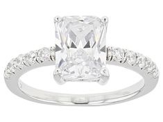 Bella Luce® white diamond simulant 4.35ctw rectangular cushion and round, rhodium over sterling silver ring. Measures approximately 0.81" L x 0.31" W and is not sizable. Diamond equivalent weight is 2.63ctw. White Radiant Cut Cubic Zirconia Ring, White Cubic Zirconia Square Cut Ring, White Rectangular Cubic Zirconia Ring, White Rectangular Rings With Center Stone, White Rectangular Diamond Ring With Prong Setting, White Rings With Center Stone Square Cut, Rectangular Cushion, Man Made Diamonds, Diamond Simulant