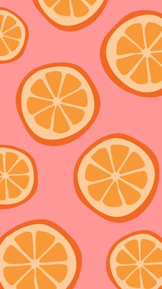 an orange slice pattern on a pink background