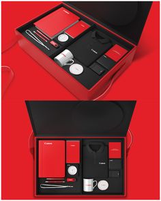 an open black box with red items in it on a red background and the contents inside