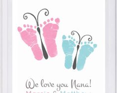 two baby footprints with the words, we love you mama and marc & mathew