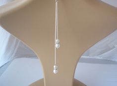 Teardrop Pearl and diamante back chain necklace Matching earrings: https://www.etsy.com/uk/listing/1331878284 Handmade to order using 9 & 12mm quality teardrop pearls and 6mm round glass pearls, with 6mm crystal diamante spacers, on silver or gold plated curb chain Please let me know which pearl colour and finish you would like in the personalisation section The necklace and backdrop will be made to your chosen lengths (please see the size guide in the photo gallery) The backdrop measurement is White Dangle Backdrop Necklace With Adjustable Chain, White Pearl Drop Backdrop Necklace, Adjustable White Drop Necklace For Wedding, White Adjustable Drop Necklace For Wedding, Adjustable White Dangle Backdrop Necklace, White Adjustable Dangle Backdrop Necklace, Elegant White Teardrop Backdrop Necklace, White Long Drop Backdrop Necklace For Wedding, Long Drop Pearl Necklace For Wedding