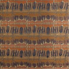 an orange, blue and brown pattern on fabric