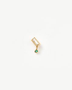 Fine Emerald Single Drop Stud Earring 14ct Solid Gold/Emerald. This Single Drop Earring is an Elevated Take on Our Signature Studs, Featuring a Baguette-Shaped White Topaz Stone with a Drop Round Emerald Charm. Mix and Match with Other Refined Designs. Handcrafted from 100% Certified Recycled Solid Gold, and Hallmarked for Authenticity. Metal: 14Ct Recycled Yellow Gold Dimensions: 4mm X 7. 6mm Gemstone: Emerald Weight: 0. 5g Product Code: Fj-G-E31-Wt-Em-Hf Bee Purse, Emerald Style, Earring Trends, Mini Hoop Earrings, Hoop Earring Sets, Demi Fine Jewelry, Solid Gold Jewelry, Emerald Earrings, Topaz Stone