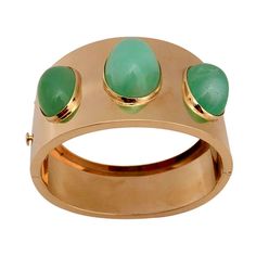 Gold and Jade Hinged Cuff Bracelet | From a unique collection of vintage cuff bracelets at http://www.1stdibs.com/jewelry/bracelets/cuff-bracelets/ Arm Jewellery, Deer Antler Ring, Chrysoprase Jewelry, Vintage Cuff Bracelet, Antler Ring, Multicolor Jewelry, Arm Jewelry, Casual Jewelry, Gems Jewelry