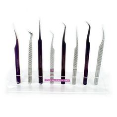 five different sized toothbrushes in a display case