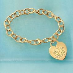 Ross-Simons - Monogram Italian 14kt Yellow Gold Heart Charm Bracelet. 8". Our classic 14kt yellow gold cable link bracelet with a heart charm is a lovely piece that dresses up any ensemble! Charm comes personalized with monogram in block or script. Made in Italy. Lobster clasp, 14kt yellow gold bracelet. Elegant Gold Charm Bracelet With Heart Charm, Classic Heart Charm Bracelet, Classic Gold Charm Bracelet With Heart, Classic Yellow Gold Heart Charm Bracelet, Classic Heart-shaped Gold Bracelet For Anniversary, Classic Gold-tone Charm Bracelet Gift, Classic Gold-tone Charm Bracelet As Gift, Classic Gold-tone Charm Bracelet For Gift, Gold Heart Charm Bracelet Classic Style