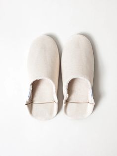 A trusty pair of slippers are an easy way to slip into relaxation without dragging the outside elements into your home. This pair, from one of Japan’s leading slipper makers, checks all of the boxes with its good looks, functionality, and comfort. Its shell is made from “No. 8” duck canvas, a material often found in sn Room Shoe, Cleaning Drawing, Person Falling, Japanese Store, Home Shoes, Duck Canvas, Cold Night, How To Make Shoes, No 8