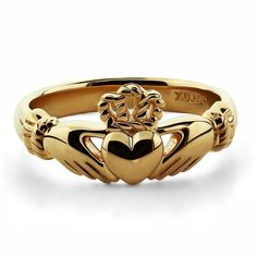 14K Yellow Gold Claddagh Ring. Excellent Quality. Available in sizes from 4 through 9 with half size increments. This ring has been perfectly designed against wear specifically at the shank of the ring so it will last. Perfectly polished, excellent quality, nice looking claddagh ring. Measurements: The ring pictured is in size 6.5 and weighs around 4.50 grams of 14K yellow gold. Face from the bottom of heart to top of the crown: 9.27 mm (0.36 inches) Shank bottom width: 3 mm (0.12 inches) Weight Gold Claddagh Ring, Gold Font, Irish Rings, Cuff Bracelets Handmade, Claddagh Ring, Claddagh Rings, Ring Crafts, Bangles Jewelry, Love Ring