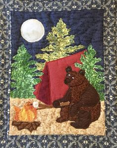 there is a bear that is sitting next to a campfire with a tent in the background