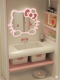 there is a hello kitty bathroom with pink lights