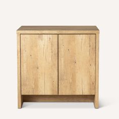 the sideboard is made from wood and has two doors, one door open to reveal a