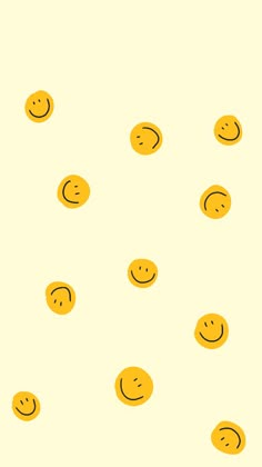 many yellow smiley faces are arranged in the shape of small circles on a white background