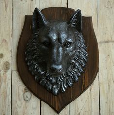 A wall sculpture of a wolf's head on a wooden base - this is a unique artistic piece that will give your interior a distinctive character and a touch of the wild. Crafted from eco-friendly materials, including eco-plastic and natural wood, it will serve as a beautiful decorative element for various spaces. This sculpture can be used as a decorative item for your living room, bedroom, or office. It adds a touch of natural beauty and wilderness to your interior while seamlessly blending with vario Wolf Head, Friendly Plastic, Animal Heads, Wall Sculpture, Rustic Cabin, Wooden Base, Wall Sculptures, The Wild