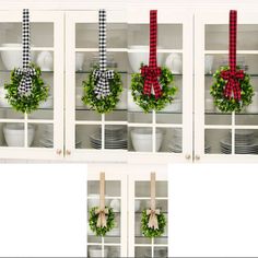 christmas wreaths are hung on the back of white china cabinet doors with red bows