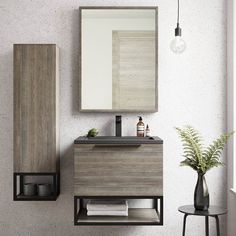 a bathroom with a sink and mirror next to a plant in a vase on the floor