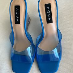 Brand New Never Used With Tags Aqua Blue Slippers Clear On Top And Clear Heels Very Pretty. Blue Casual Non-slip Jelly Sandals, Aqua Blue Heels, Trendy Blue Sandals With 4-inch Heel, Blue Non-slip Jelly Sandals For Beach, Blue Leather Sandals, Clear Sandals, Blue Slippers, Blue Synthetic Sandals With 4-inch Heel, Aqua Shoes