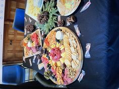 an overhead view of a platter of food with pineapples on the side