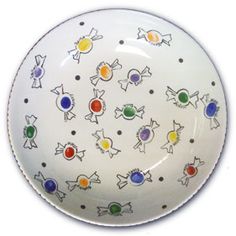 a white plate with colorful designs on it