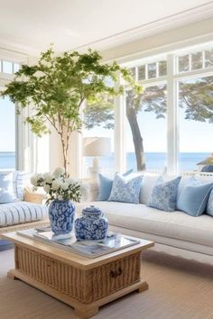 a living room with blue and white decor