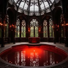 the inside of a building with a red pool in front of large windows and an arched ceiling