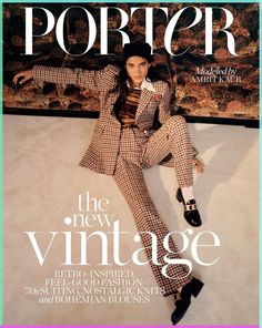 a magazine cover with a woman laying on the floor wearing a suit and tie,