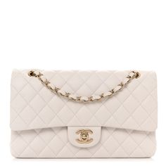 This is an authentic CHANEL Caviar Quilted Medium Double Flap in White. This stunning shoulder bag is crafted of diamond quilted luxurious caviar leather in white. The bag features polished light gold chain link leather threaded shoulder straps, a rear patch pocket, and a facing polished light gold Chanel CC turn lock. This opens to a matte white leather interior with patch pockets. White Purse Outfit, Winter Purses Handbags, White Chanel Bag, New Louis Vuitton Handbags, Purse Outfit, Chanel Double Flap, Latest Handbags, Chanel Flap Bag, Popular Handbags