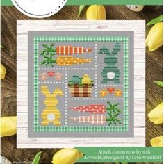 a cross stitch pattern with the words happy easter on it and some yellow tulips