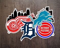 detroit tigers and detroit lions stickers on wooden boards with city skyline in the background