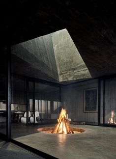 a fire pit in the middle of a room