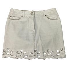 Product details: The skirt features floral cut offs on the bottom of the skirt, mini length and silver tone hardware. Chic Cutoff Mini Skirt For Spring, Elegant Cotton Denim Skirt For Spring, Designer Fitted Bottoms For Spring, Celine Denim, White Denim Mini Skirt, Polyvore Clothes, Mini Skirt White, Silk Evening Gown, Twill Skirt