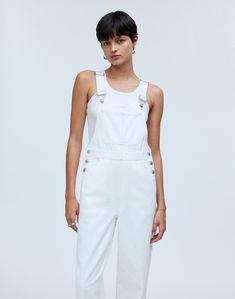 The cut: our beloved best seller, these oversized overalls are super relaxed with workwear details like knee patches, cuffable hems, a hammer loop and those extra side pockets (for a measuring tape, nails or, you know, a phone).The fabric: premium 100 percent cotton white Cone denim with old-school character, no stretch and zero show-through.Classic white shade.11 1/2" rise, 17" leg opening, 27" inseam.100% cotton.Do Well: By buyingcotton products from Madewell, you're supporting our investment Utility Denim Jumpsuit With Patch Pockets For Work, Utility Overalls With Adjustable Straps For Everyday, Everyday Utility Overalls With Adjustable Straps, Utility Overalls With Patch Pockets For Spring, Utility Overalls With Patch Pockets For Work, Utility Overalls With Relaxed Fit For Everyday, Workwear Denim Overall Jumpsuit With Patch Pockets, Cotton Denim Jumpsuit With Patch Pockets For Work, Workwear Overalls With Patch Pockets