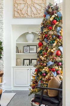 a decorated christmas tree in a living room