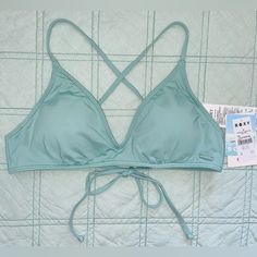 Dull Teal Colored Roxy Women’s Beach Classics Triangle Bralette Bikini Top. Removable Padding. V Plunge Neck Detail. Can Tighten Crossing Shoulder Straps By Tying Taut Behind Back. Sizes Medium And Large Available. Both New With Tags. Feel Free To Ask Questions Or Make Me An Offer!! **Stock Photo Color Is Different From Actual Top Color And Just To Show Fit** Padded V-neck Swimwear For The Beach, Bra-friendly Blue V-neck Swimwear, Roxy Bathing Suits, Bathing Suit Bottoms, Roxy Women, Bathing Suit Top, Triangle Bralette, Cheeky Bikinis, Green Fashion