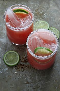 two glasses filled with watermelon and lime margaritas