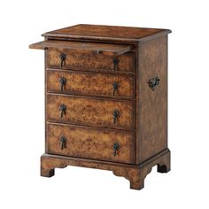 an old wooden chest with three drawers