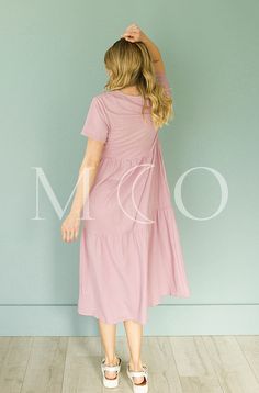 A customer's favorite Tee Dress is back in NEW colors for Spring/Summer! Our Kelsey is made for the runs to the grocery store, date night, vacations, cover ups for swimsuits, & so much more! A versatile style that can be dressed up or down. Additions include pockets, high end fabric that does not pill, or fade with wear! Product Fit + Details: High quality T-shirt fabric Round neckline Pockets True to size Loose comfortable fit Flowy fabric Tiered skirt Available in Periwinkle, & Mauve Mist Mode Colors For Spring, Best Summer Dresses, Flowy Fabric, Loose Fitting Dresses, Fit Details, Cover Ups, Swimsuit Fashion, Shirt Fabric, Tier Skirt