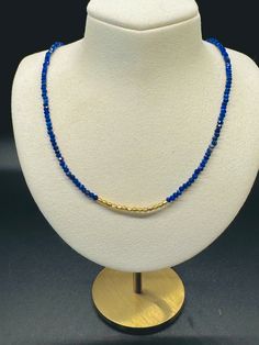 I love deep blues with gold and this necklace is stunning! 17 inches in length but can have a 2 inch extender chain Blue Beaded Dainty Necklace, Gold Lapis Lazuli Spiritual Necklace, Dainty Blue Beaded Necklace, Blue Necklaces With Gold Round Beads, Elegant Gold Beaded Necklaces With Lapis Lazuli, Blue Necklace With Gold Round Beads, Adjustable Single Strand Sapphire Necklace, Spiritual Blue Faceted Bead Necklaces, Gold Lapis Lazuli Faceted Beads Necklace