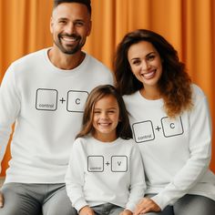 "Get ready to match in style with our Control C Control V Sweatshirt! Perfect for Father's Day or any day, these Family Matching Hoodies bring humor and unity. Embrace the fun with our Funny Family Matching design, available in sizes for Daddy and Me. Stay cozy and coordinated with this Ctrl C Ctrl V Sweater!" Welcome to NIOBE BOUTIQUE. I am happy to see you in my shop. My main purpose is to meet you with a high-quality product. I use the best product to make you happy. Your satisfaction is my p Funny Cotton Sweatshirt For Winter, Funny Long Sleeve Winter Sweatshirt, Funny Cotton Winter Sweatshirt, Family Matching Long Sleeve Cotton Sweatshirt, Family Matching Long Sleeve Winter Sweater, Funny Cotton Hoodie Sweatshirt, Funny Cotton Long Sleeve Sweater, Funny Long Sleeve Cotton Sweater, Funny White Relaxed Fit Sweatshirt