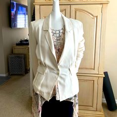 Madison Marcus Ivory Silk Blazer Jacket Never Worn Excellent Condition Not Sold With Belt And Actual Belt Is Missing Price Reflects This Fact Please See Pictures For All The Details This Jacket Has So Many Bells And Whistles. It’s Just Really Fun And Cute. Great For The Office Drinks Afterwards Running Errands. I Bought This Jacket At Bloomingdale’s In Sherman Oaks California. It Has Hung In My Closet Ever Since Shortly After Buying It I Had My Fifth Back Surgery And After I Was Told I Could Not Elegant Cream Blazer For Fall, Feminine Cream Outerwear For Formal Occasions, Spring Office Cream Blazer, Feminine Formal Cream Outerwear, Feminine Cream Formal Outerwear, Cream Notch Lapel Outerwear For Spring, Fitted Cream Feminine Outerwear, Cream Fitted Long Sleeve Blazer, Feminine Beige Outerwear For Formal Occasions