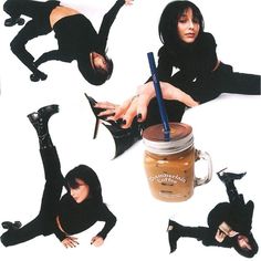 the woman is posing with her legs spread out and holding a drink in one hand