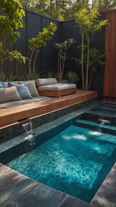 a small pool in the middle of a backyard