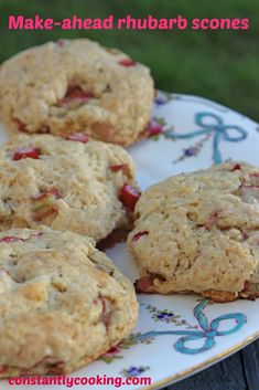 some cookies are sitting on a plate with the words make - ahead rhubarb scones