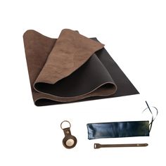 the contents of a yoga mat and other items are shown in this image, including a pair of scissors