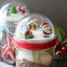 two jars filled with different types of candy